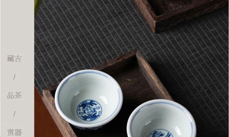 柴窑永乐青花压手杯双狮款