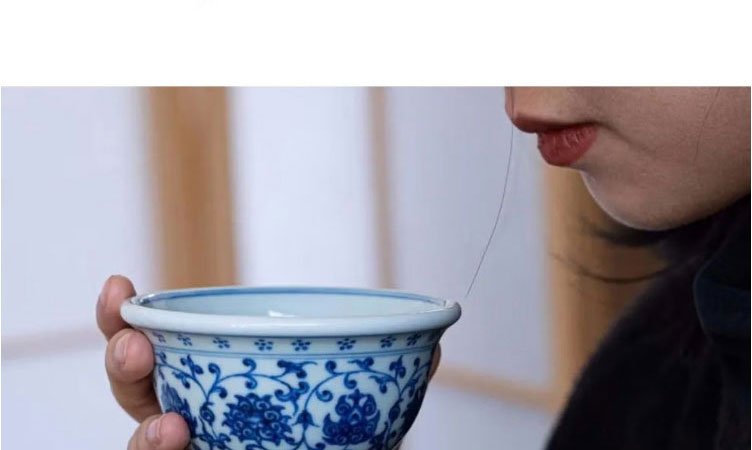 气窑永乐青花压手杯双狮款