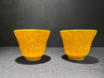 Yellow glaze engraved bell cups with entwining lotus pattern (pair)